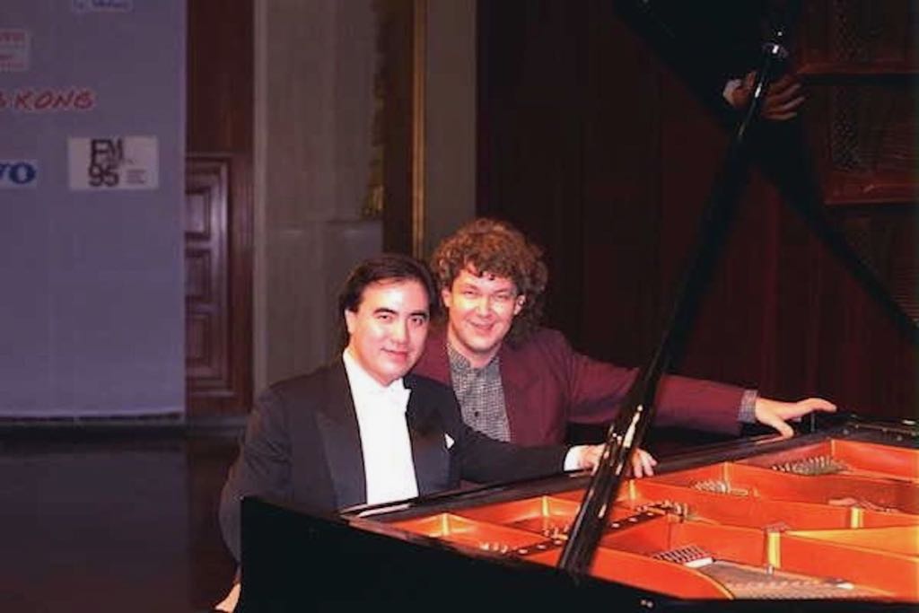 With Chinese piano legend Kong Xian Dong